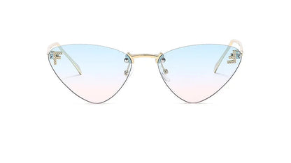 lunette de soleil bleu rose œil de chat